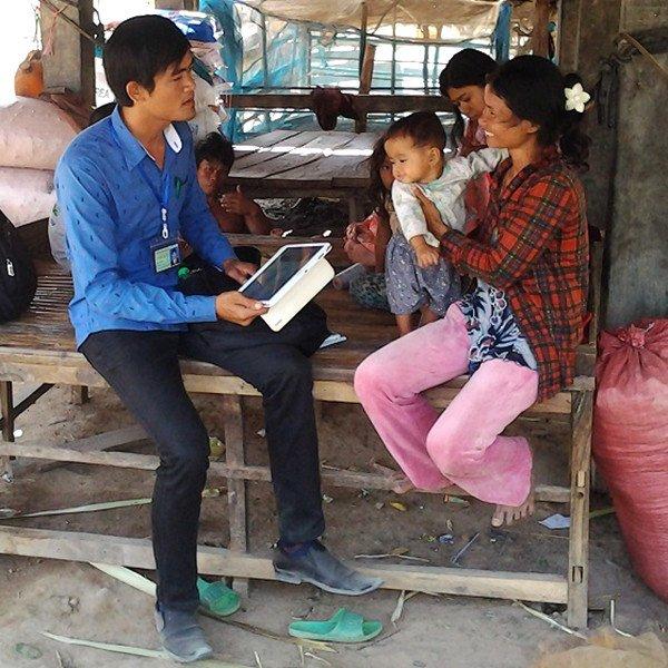 Woman and child in Cambodia taking part in survey